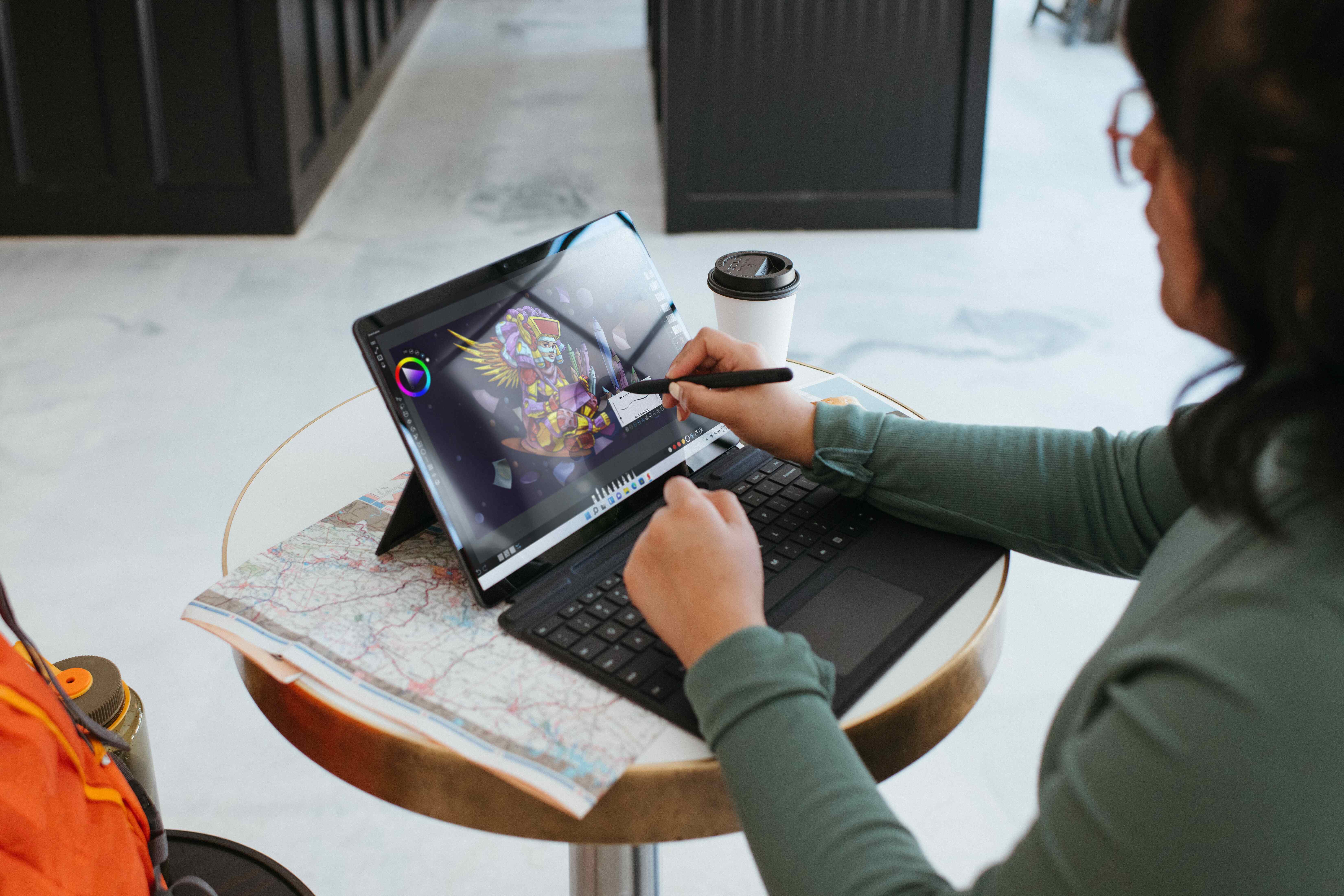 Woman drawing on a tablet